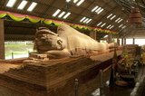 The sandstone reclining Buddha housed at Wat Dharmacakra Semaram is the oldest reclining Buddha in Thailand and dates back to the 8th century CE. The Dvaravati-style image is 13.5 metres long